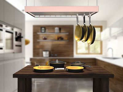 Handle cutout lets pans hang nested at an angle