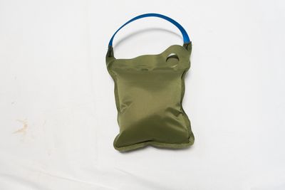 Pull the blue loop to remove from the wall