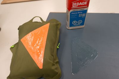 contact cement gave the desirable characteristics on a vinyl material similar to aircraft upholstery